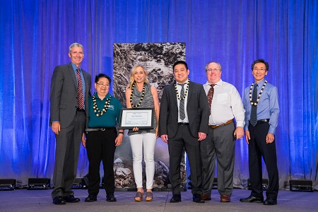 Resident Jonathan Cho and faculty members, Drs. Stacey Honda, Theresa Devere & Karen Ching, accept their award.